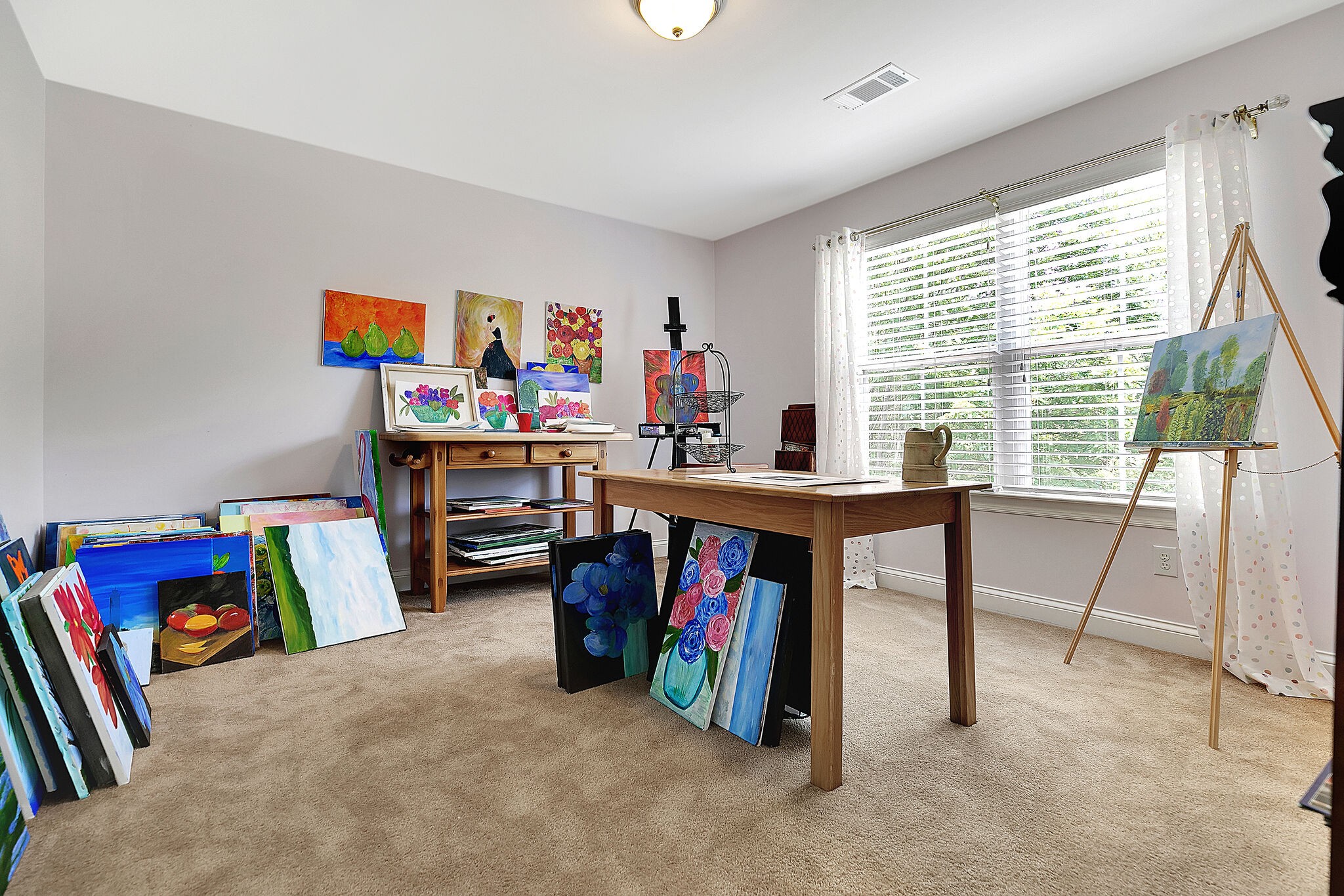 201 Verde Meadow Drive Franklin, TN 37067 - Photo 30 of 40 a children room with furniture and a flat screen tv