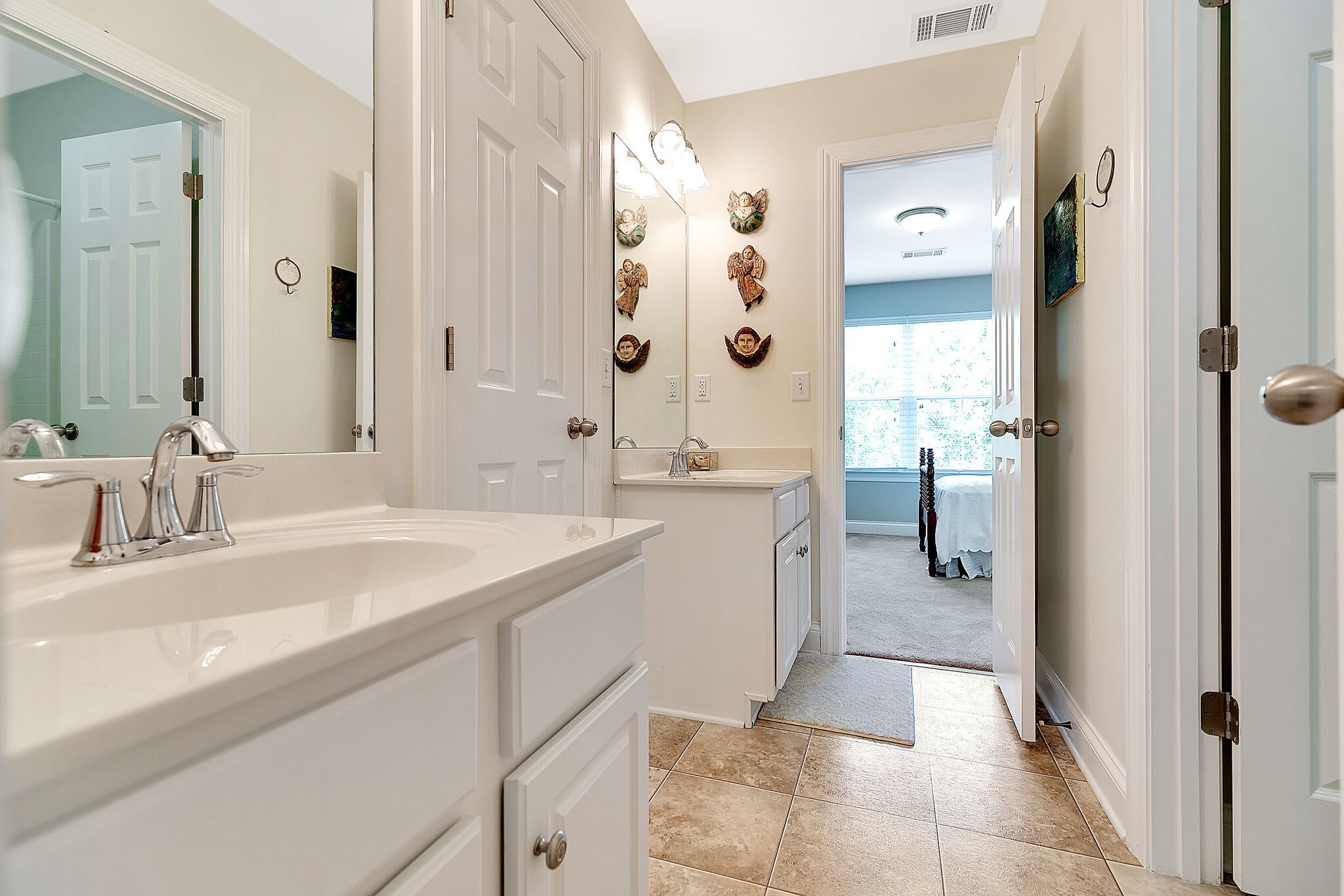 201 Verde Meadow Drive Franklin, TN 37067 - Photo 33 of 40 a bathroom with a sink a mirror and a shower