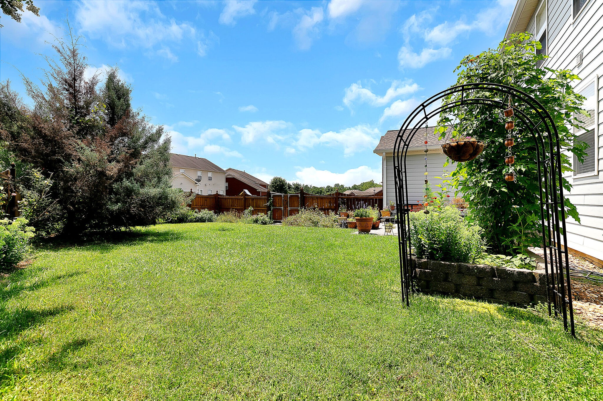 201 Verde Meadow Drive Franklin, TN 37067 - Photo 36 of 40 a front view of a house with garden