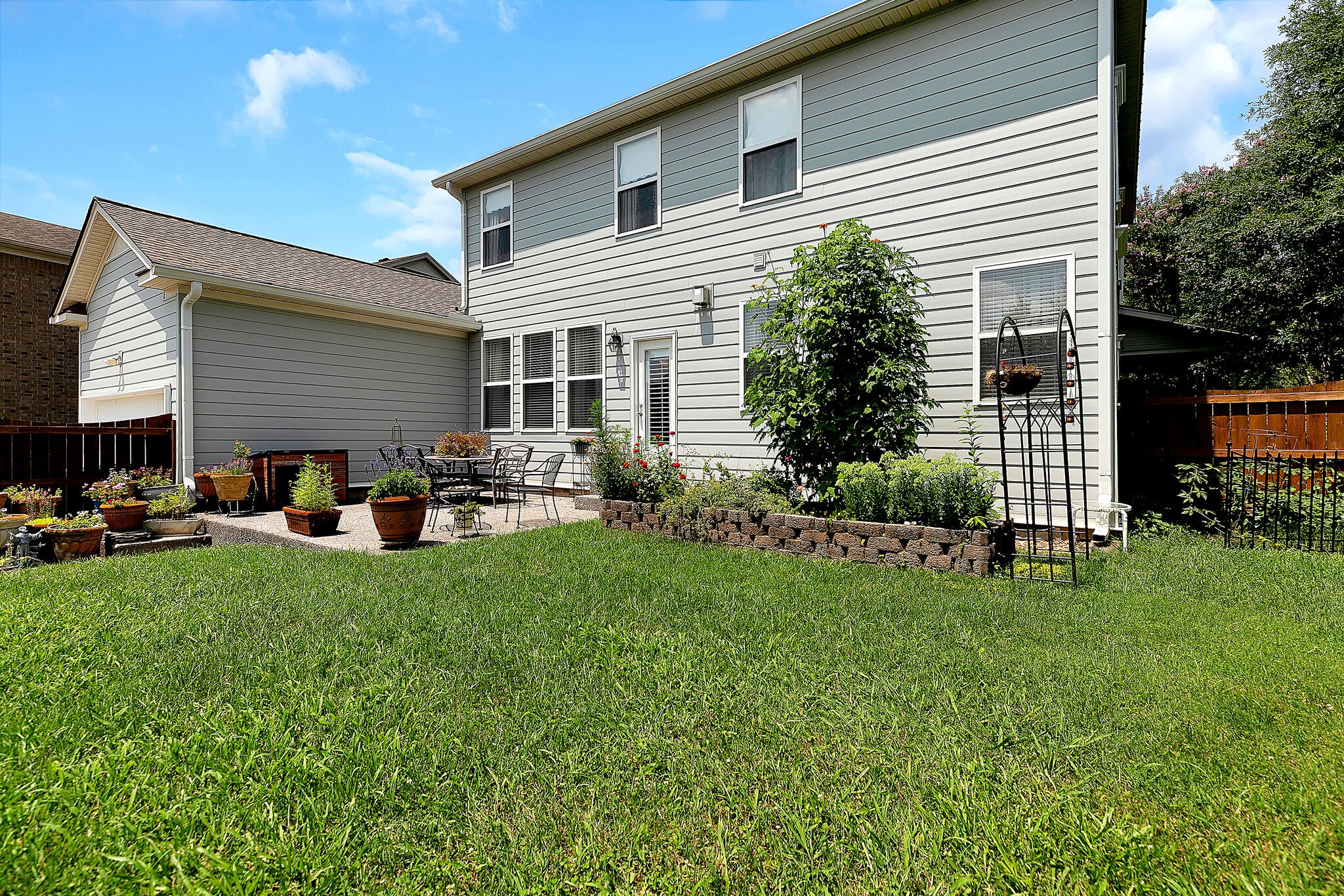 201 Verde Meadow Drive Franklin, TN 37067 - Photo 37 of 40 a front view of house with yard and outdoor seating