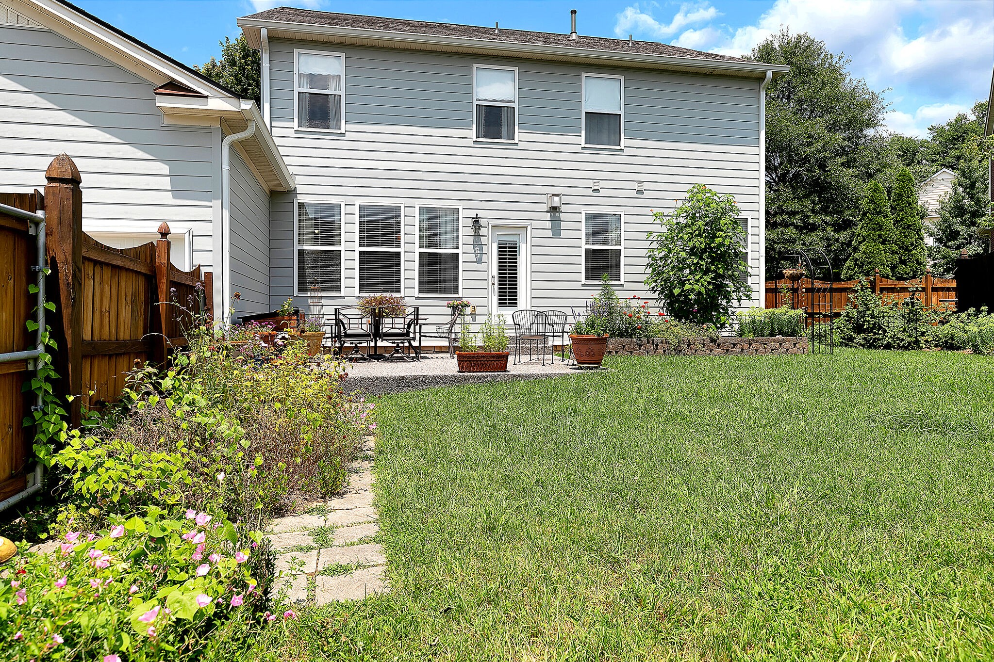201 Verde Meadow Drive Franklin, TN 37067 - Photo 38 of 40 a front view of house with yard and outdoor seating