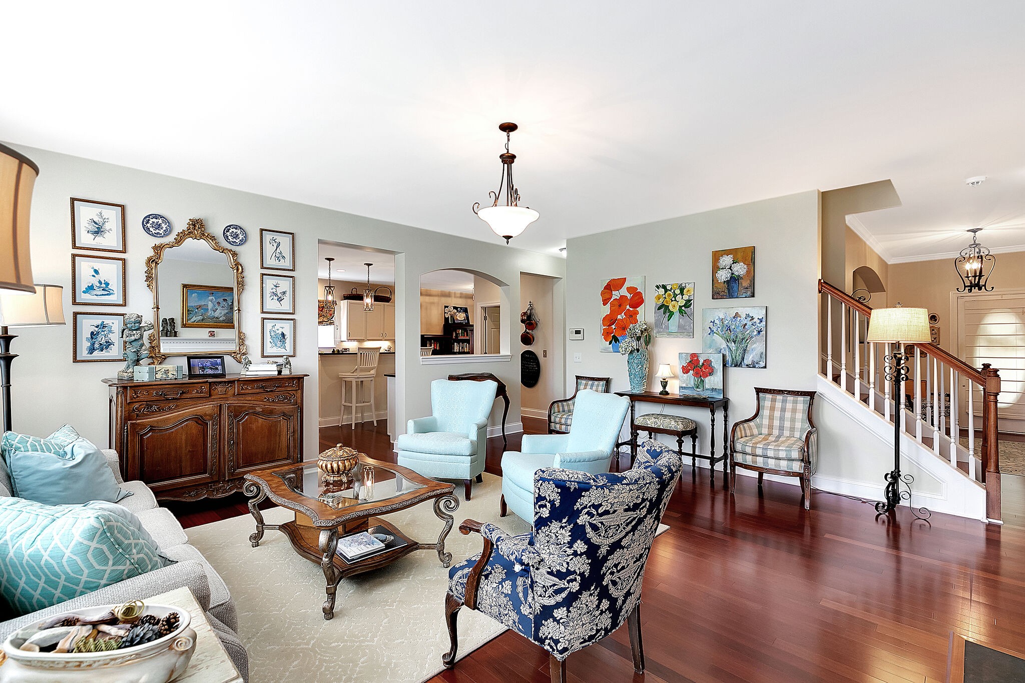 201 Verde Meadow Drive Franklin, TN 37067 - Photo 10 of 40 a living room with furniture a rug and a chandelier