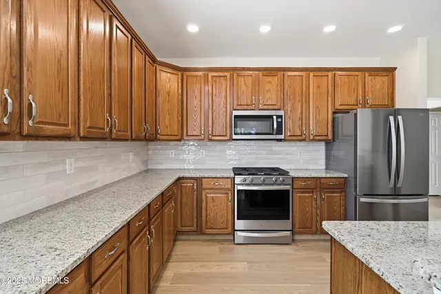 a lobby with furniture and a potted plant