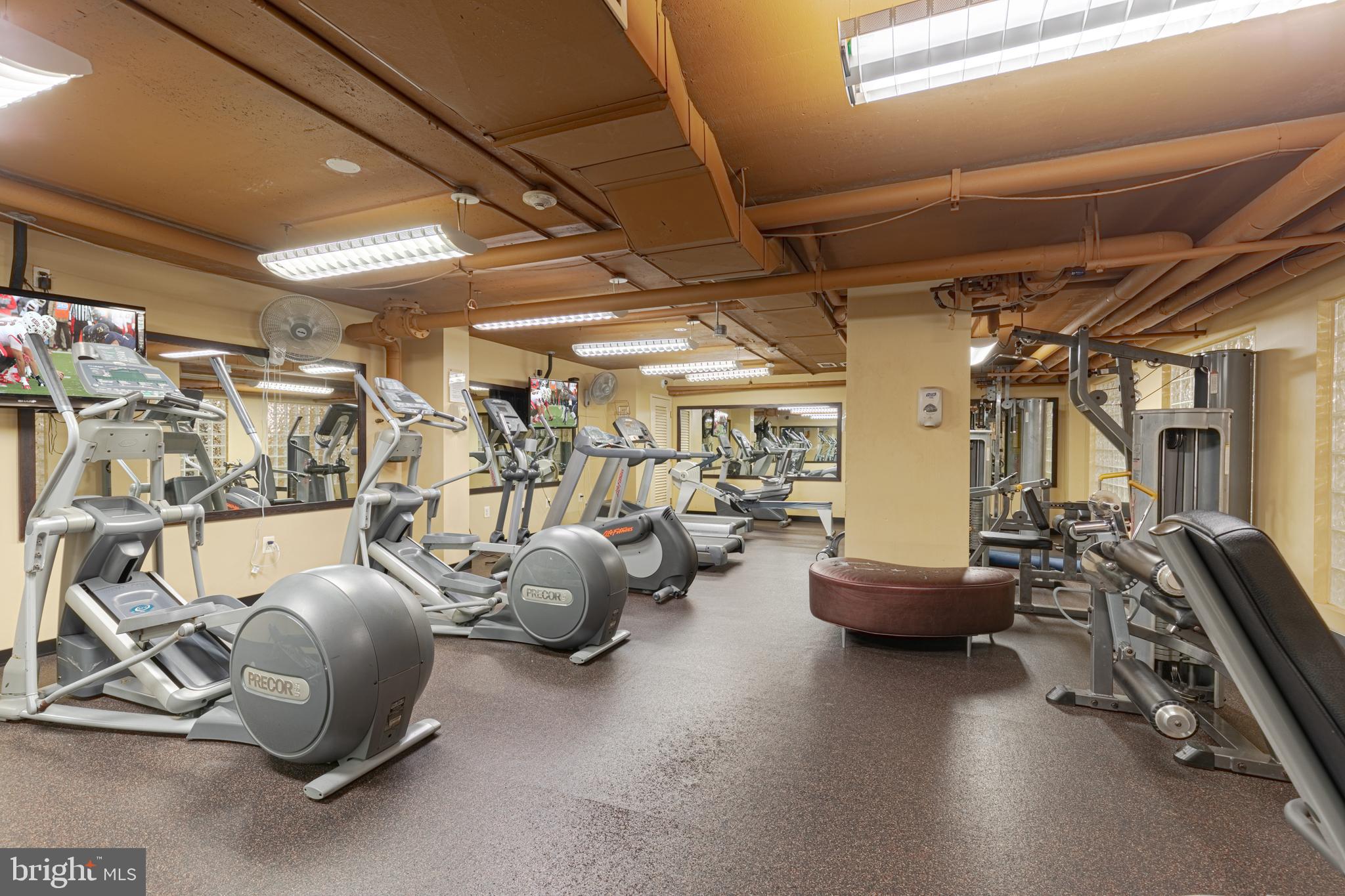 950 25th Street Northwest, Unit 327N Washington, DC 20037 - Photo 19 of 29 a view of a room with lots of gym equipment
