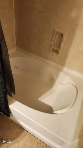 a bathroom with a bathtub