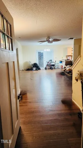 a view of a living room and hardwood