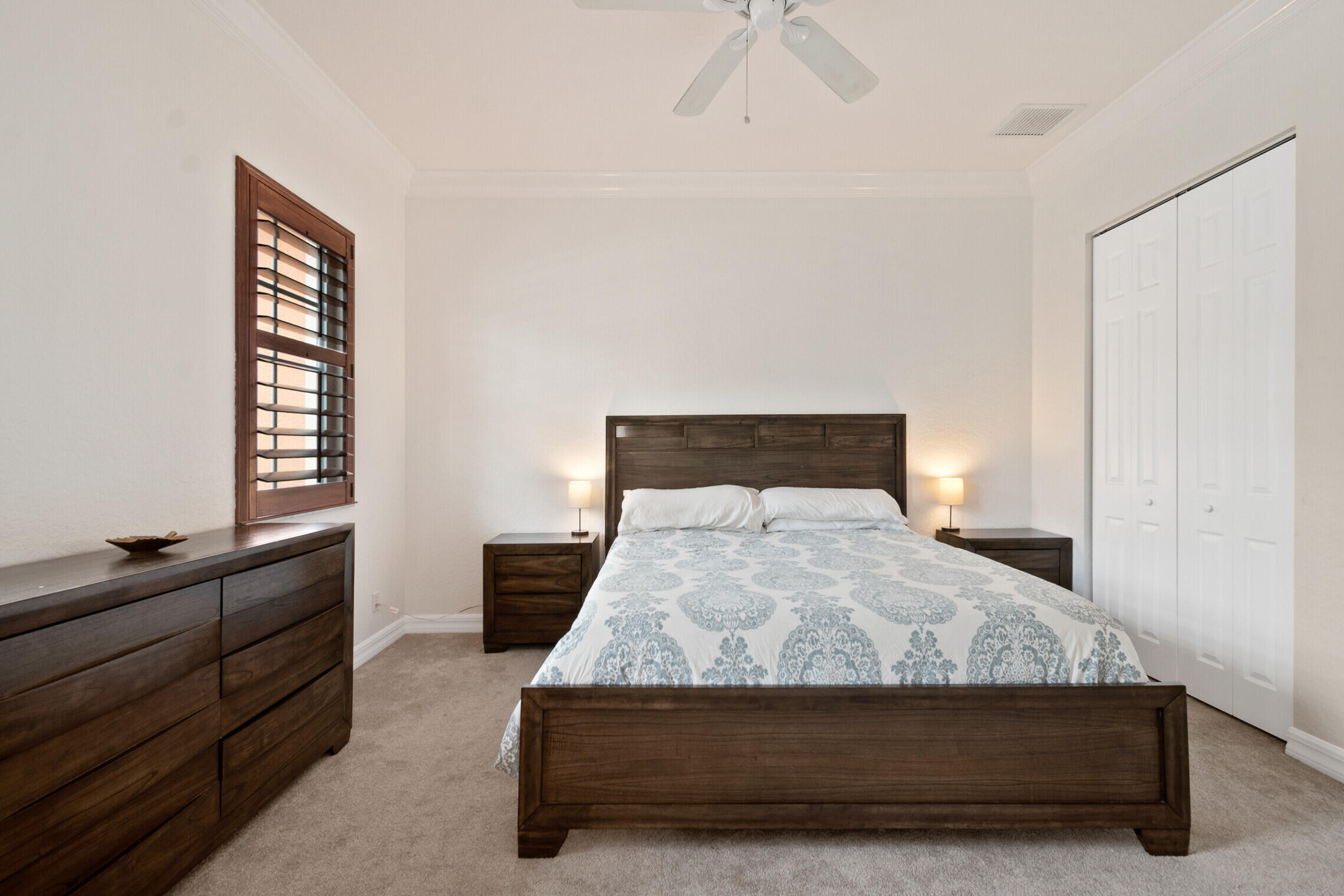 151 Mulligan Place Jupiter, FL 33458 - Photo 13 of 23 a bedroom with a bed and a window