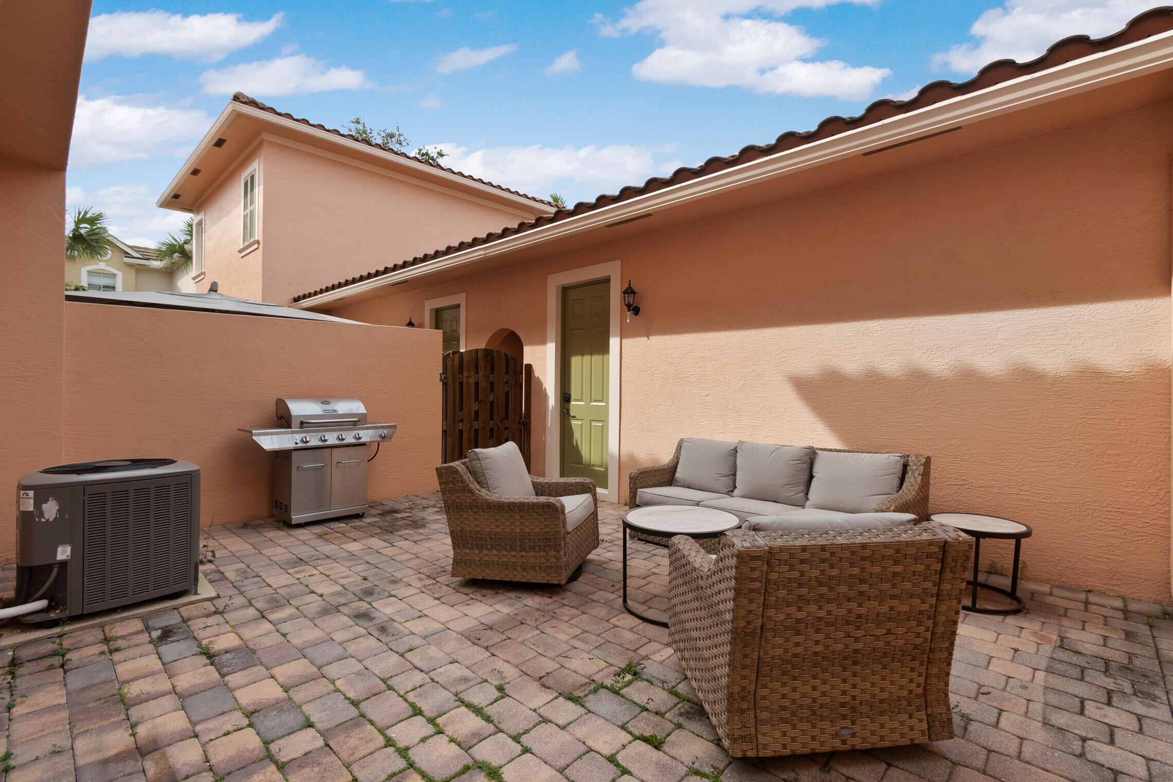 151 Mulligan Place Jupiter, FL 33458 - Photo 3 of 23 a outdoor living space with furniture