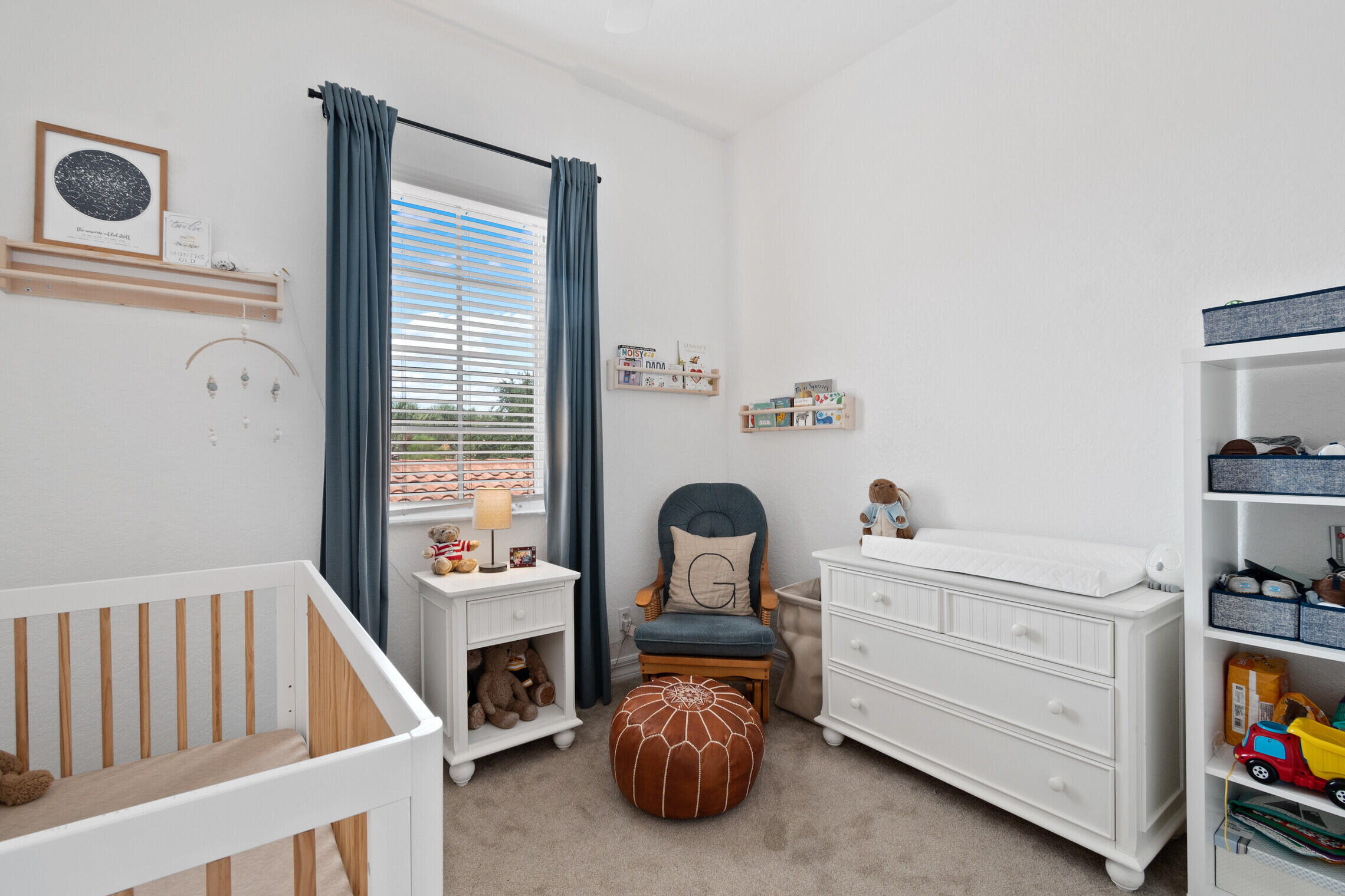 151 Mulligan Place Jupiter, FL 33458 - Photo 9 of 23 a bedroom with furniture and a window