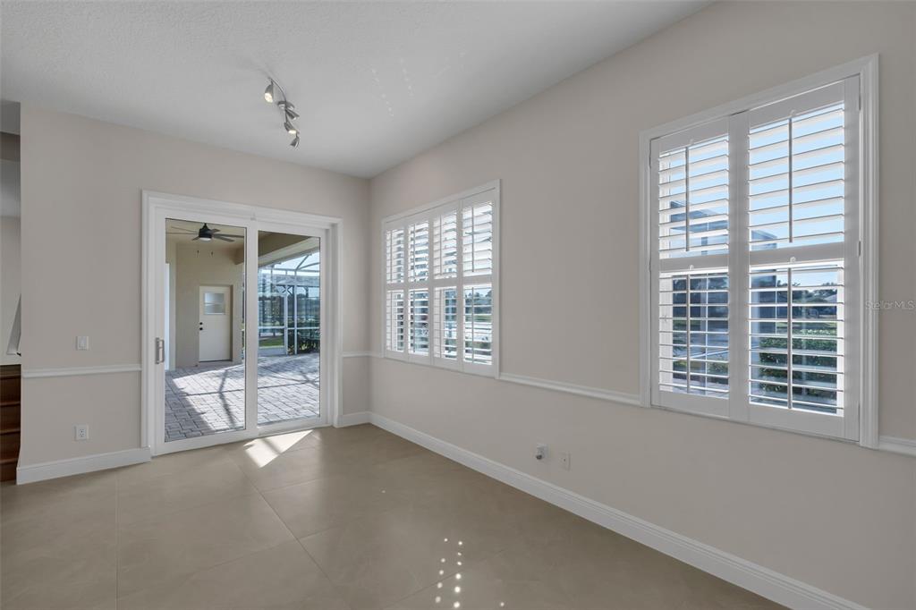 2626 Raccoon Run Lane Orlando, FL 32837 - Photo 17 of 62 a view of an empty room with a window