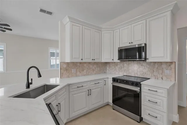a view of storage and utility room with washer and dryer
