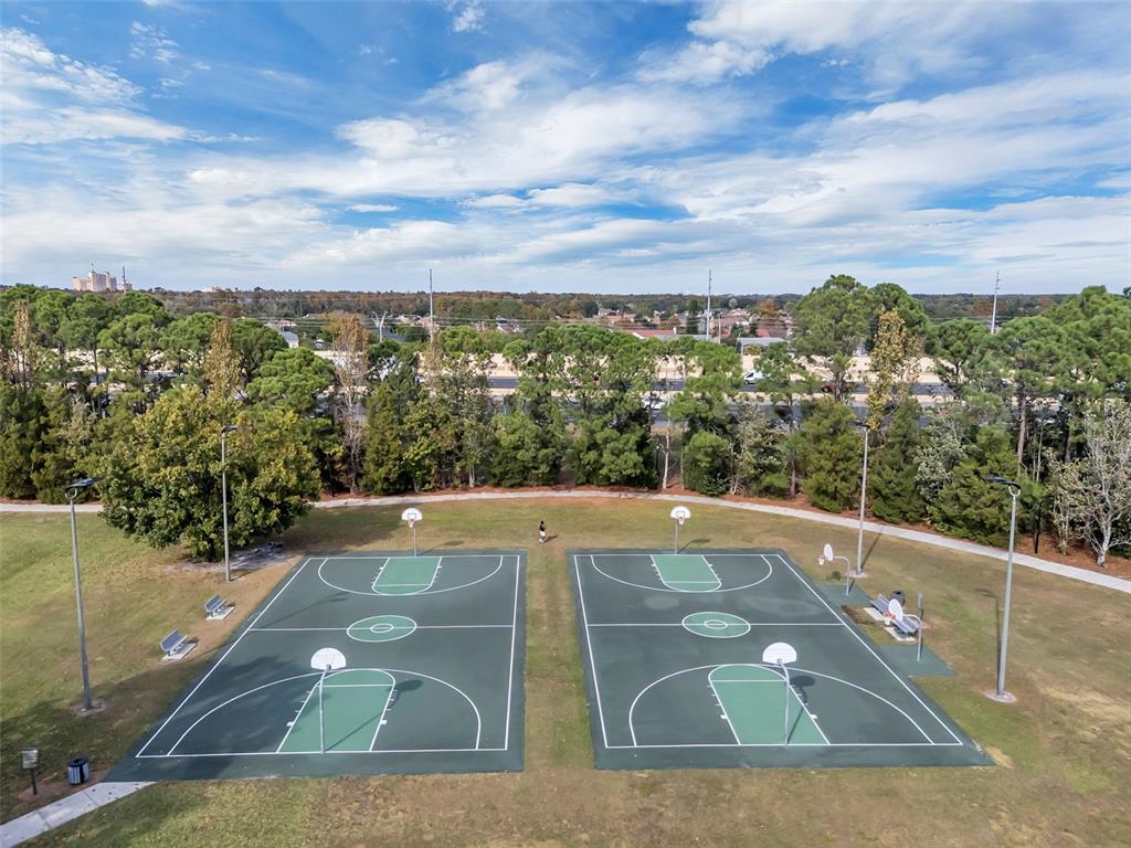 2626 Raccoon Run Lane Orlando, FL 32837 - Photo 55 of 62 a view of a tennis court