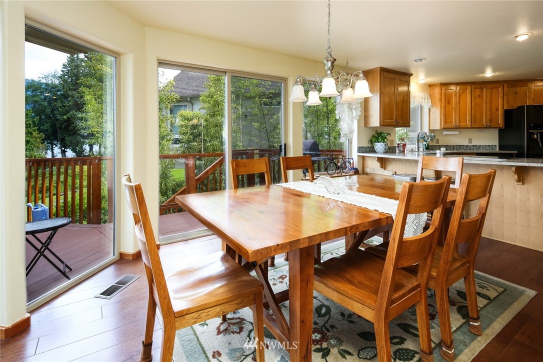 8 Inlet Circle Bellingham, WA 98229 - Photo 13 of 39 a view of a dining room with furniture window and outside view