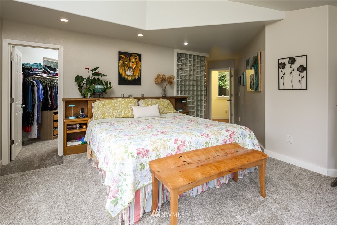 8 Inlet Circle Bellingham, WA 98229 - Photo 16 of 39 a bed sitting in a spacious bedroom next to a window