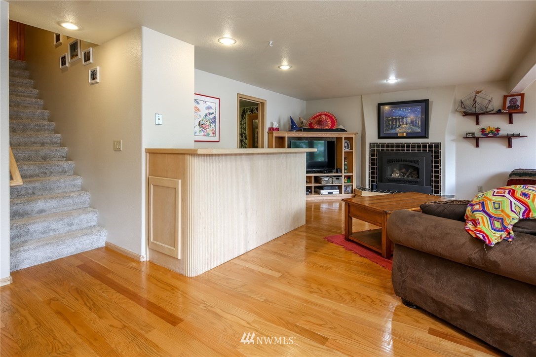 8 Inlet Circle Bellingham, WA 98229 - Photo 25 of 39 a living room with furniture and a flat screen tv