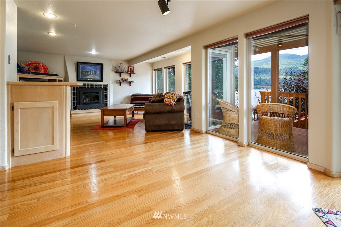 8 Inlet Circle Bellingham, WA 98229 - Photo 27 of 39 a living room with furniture and a flat screen tv