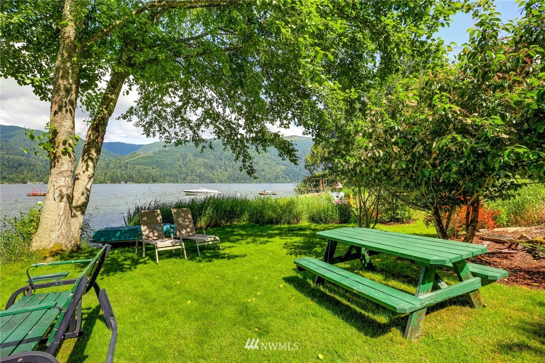 8 Inlet Circle Bellingham, WA 98229 - Photo 31 of 39 a backyard of a house with table and chairs