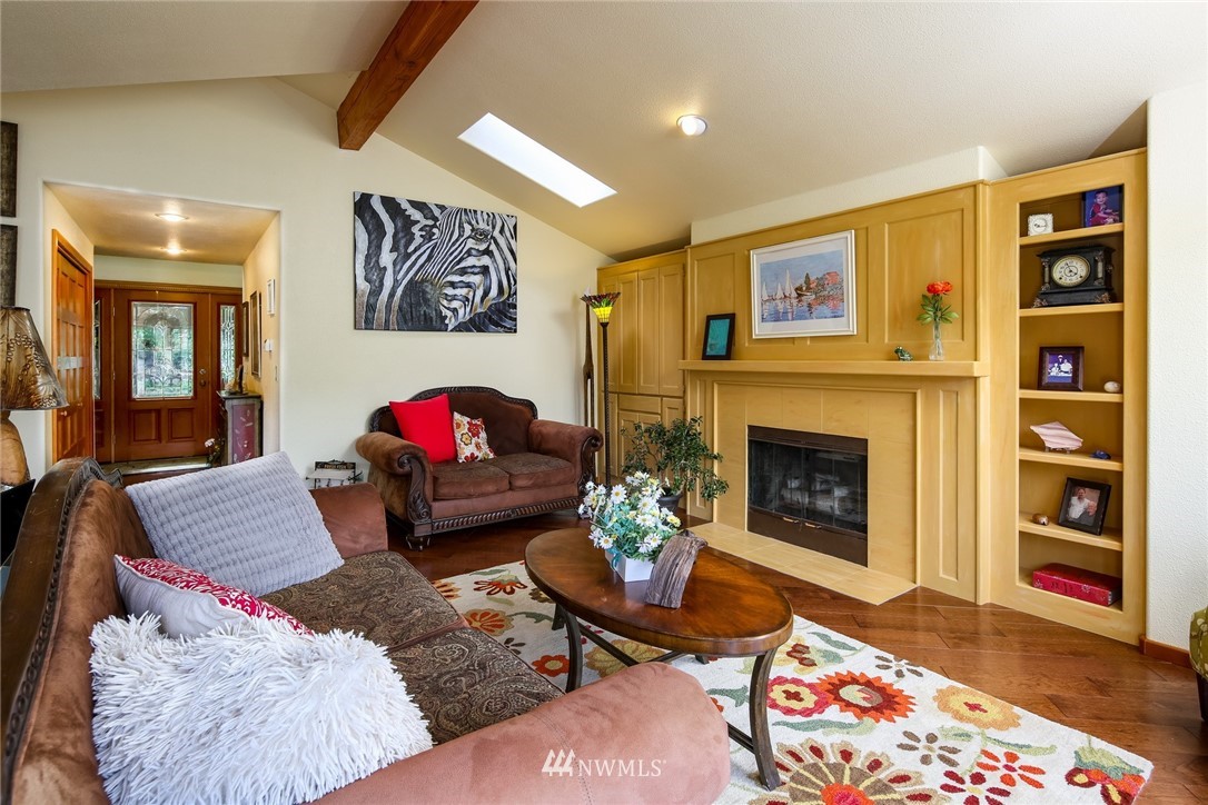 8 Inlet Circle Bellingham, WA 98229 - Photo 7 of 39 a living room with furniture and a fireplace