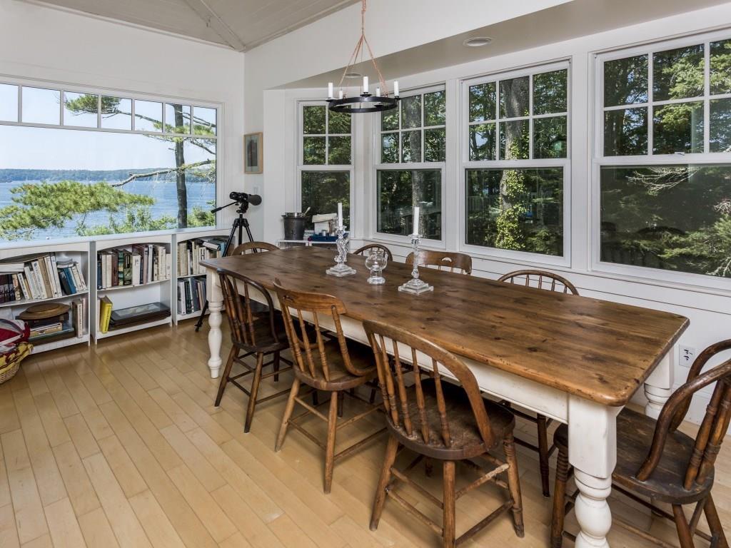 111 Paradise Point Road East Boothbay, ME 04544 - Photo 15 of 35 The sunroom/dining area with French...