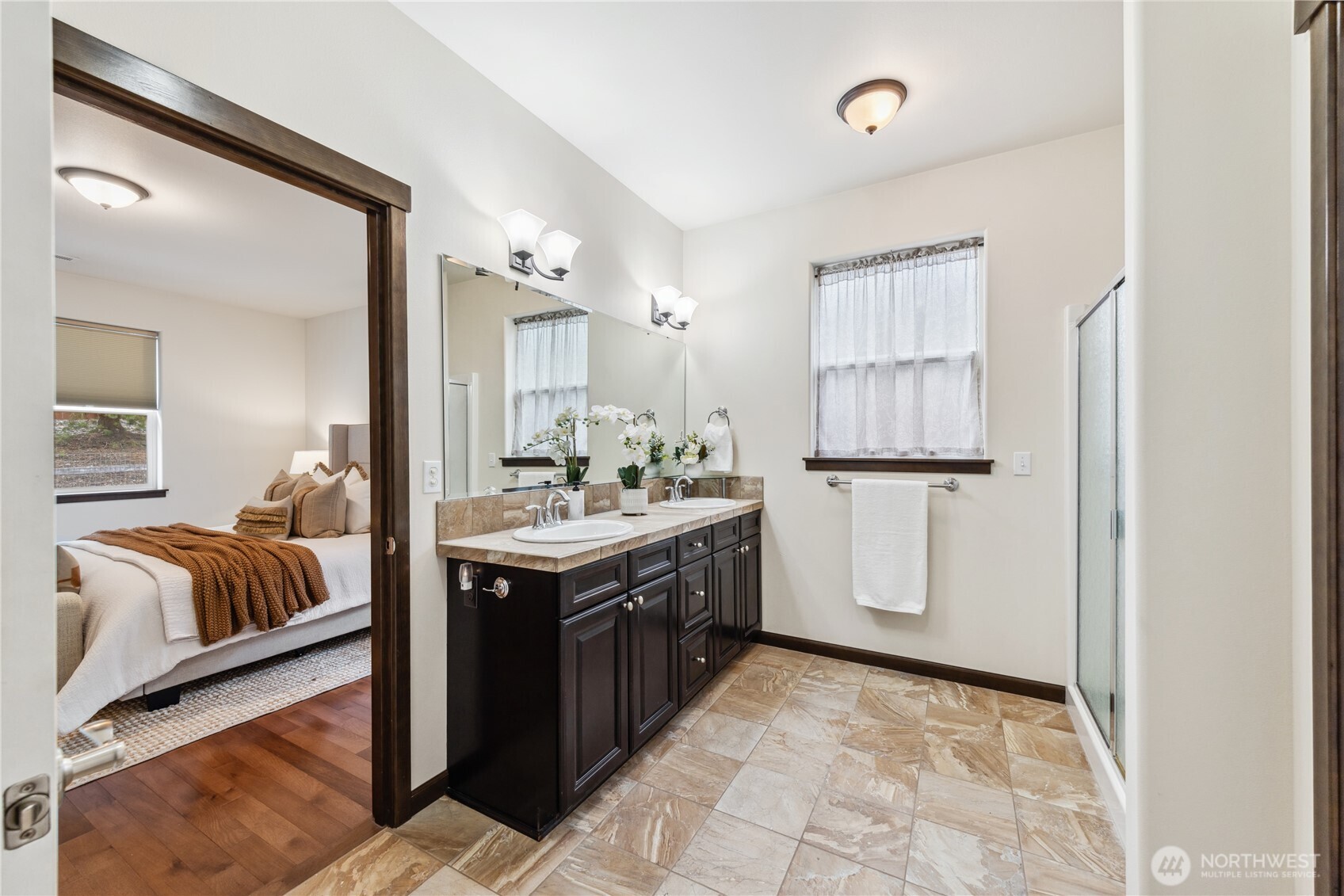 1886 Silver Loop Mount Vernon, WA 98274 - Photo 16 of 36 a spacious bathroom with a double vanity sink and a mirror