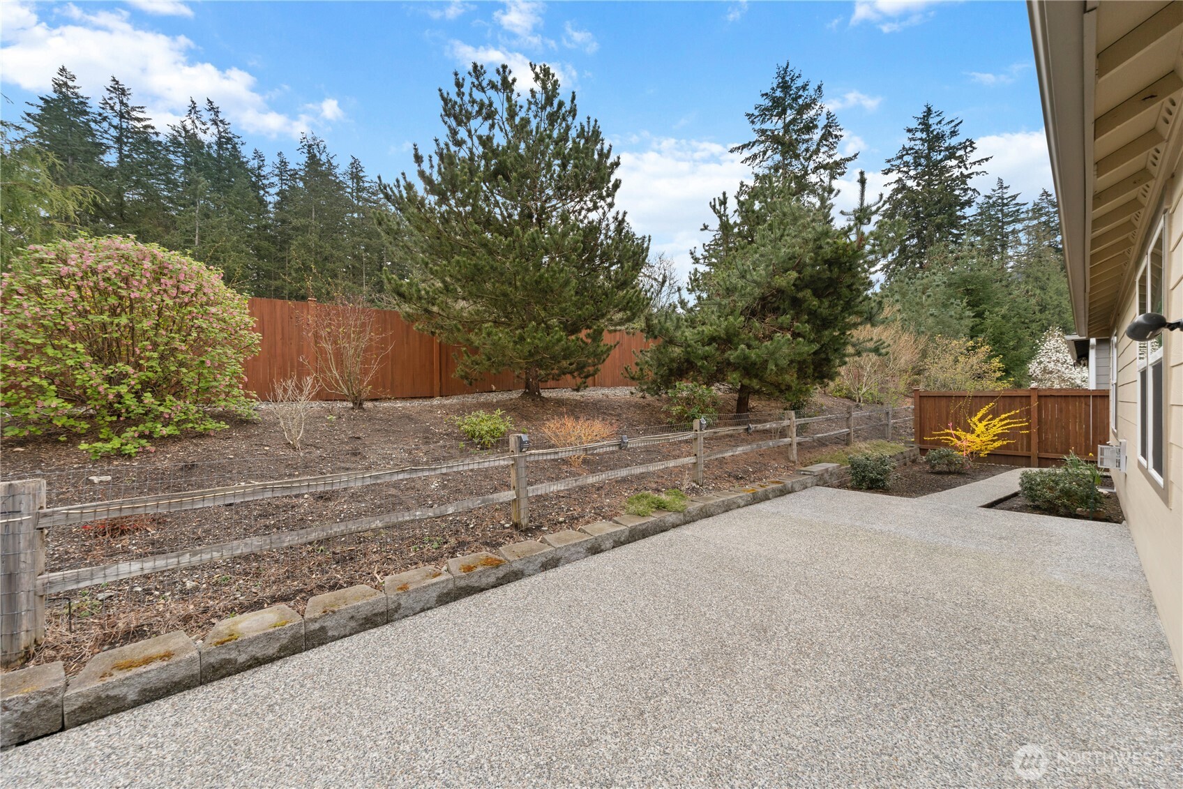 1886 Silver Loop Mount Vernon, WA 98274 - Photo 26 of 36 a view of backyard with swimming pool and trees in the background