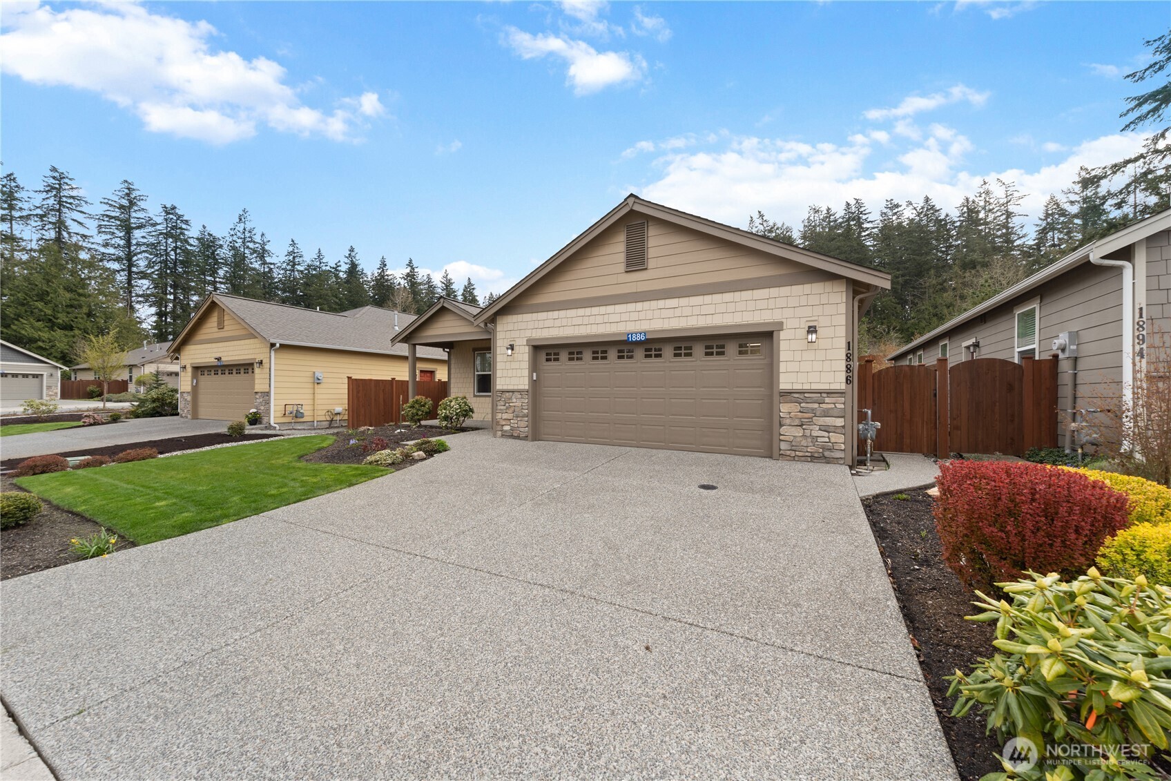 1886 Silver Loop Mount Vernon, WA 98274 - Photo 29 of 36 a front view of a house with a yard and garage