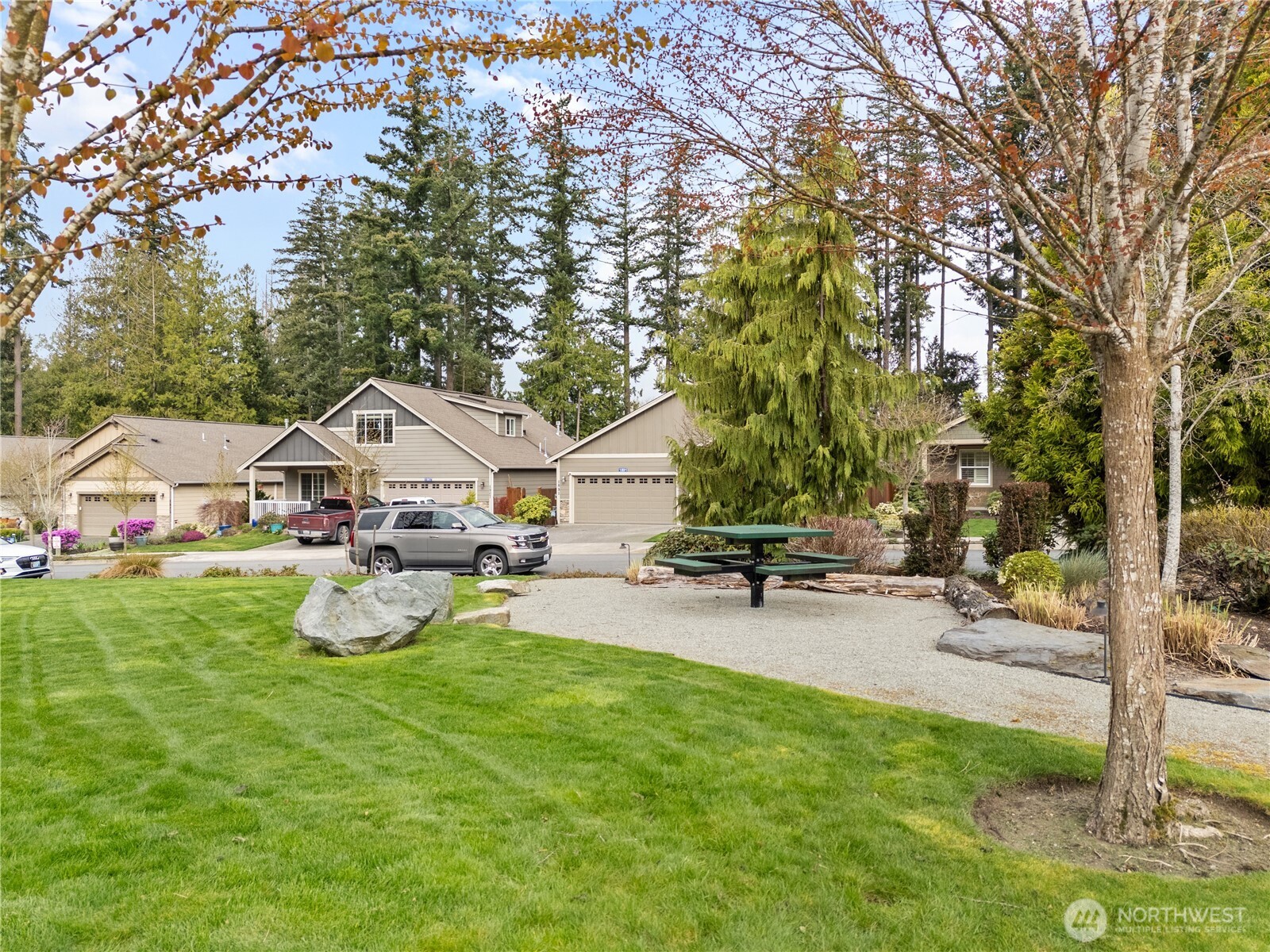1886 Silver Loop Mount Vernon, WA 98274 - Photo 32 of 36 a view of a house with backyard porch and sitting area