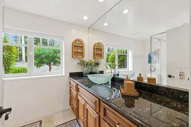 a kitchen with sink and window