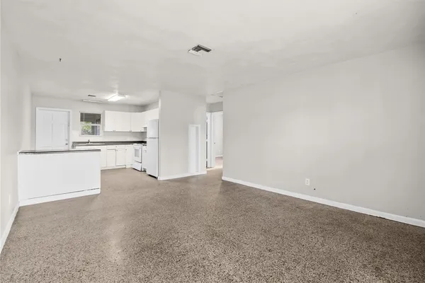 a view of a kitchen with a sink