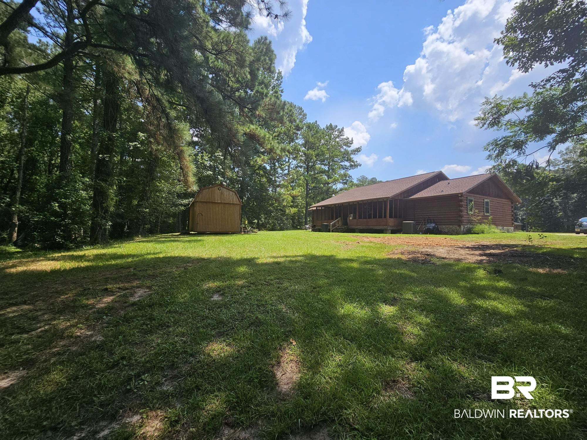 190 Magnolia Court Axis, AL 36505 - Photo 3 of 28 View of yard featuring an outdoor structure
