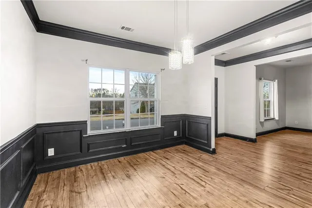 a room with window and a table