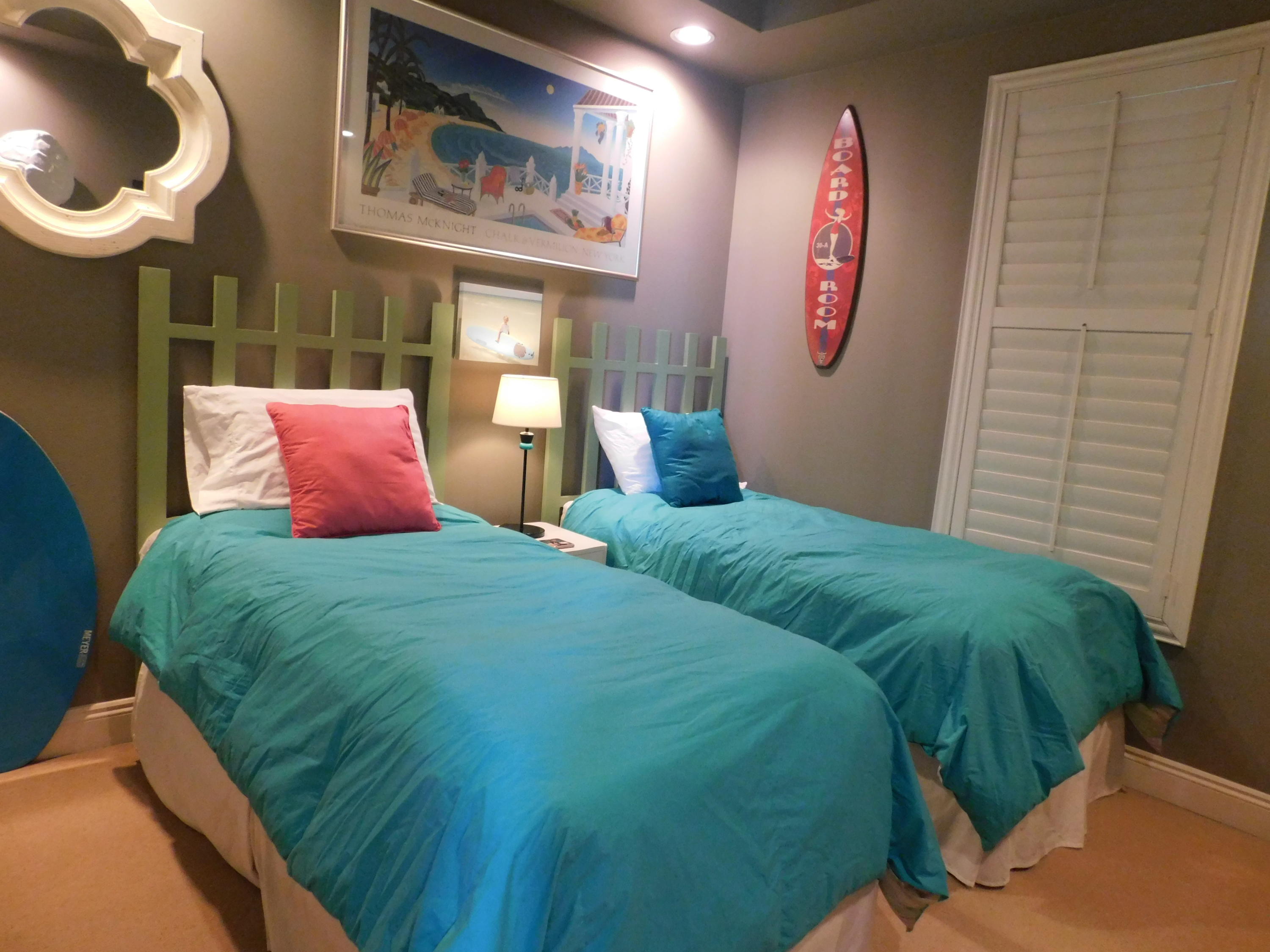 4368 West County Highway 30A, Unit 401 Santa Rosa Beach, FL 32459 - Photo 11 of 22 a bedroom with a bed and a mirror