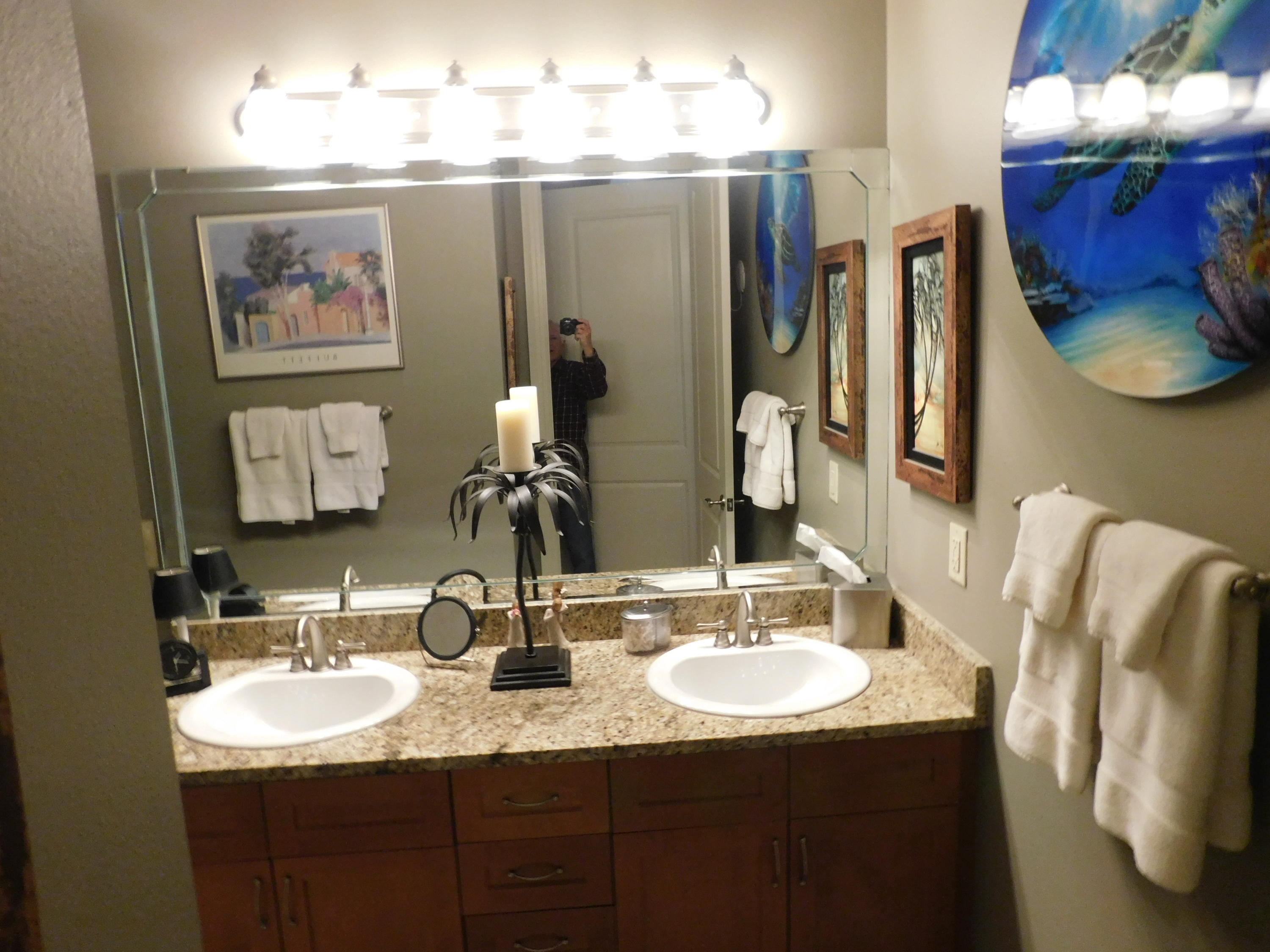 4368 West County Highway 30A, Unit 401 Santa Rosa Beach, FL 32459 - Photo 14 of 22 a bathroom with a double vanity sink and a mirror