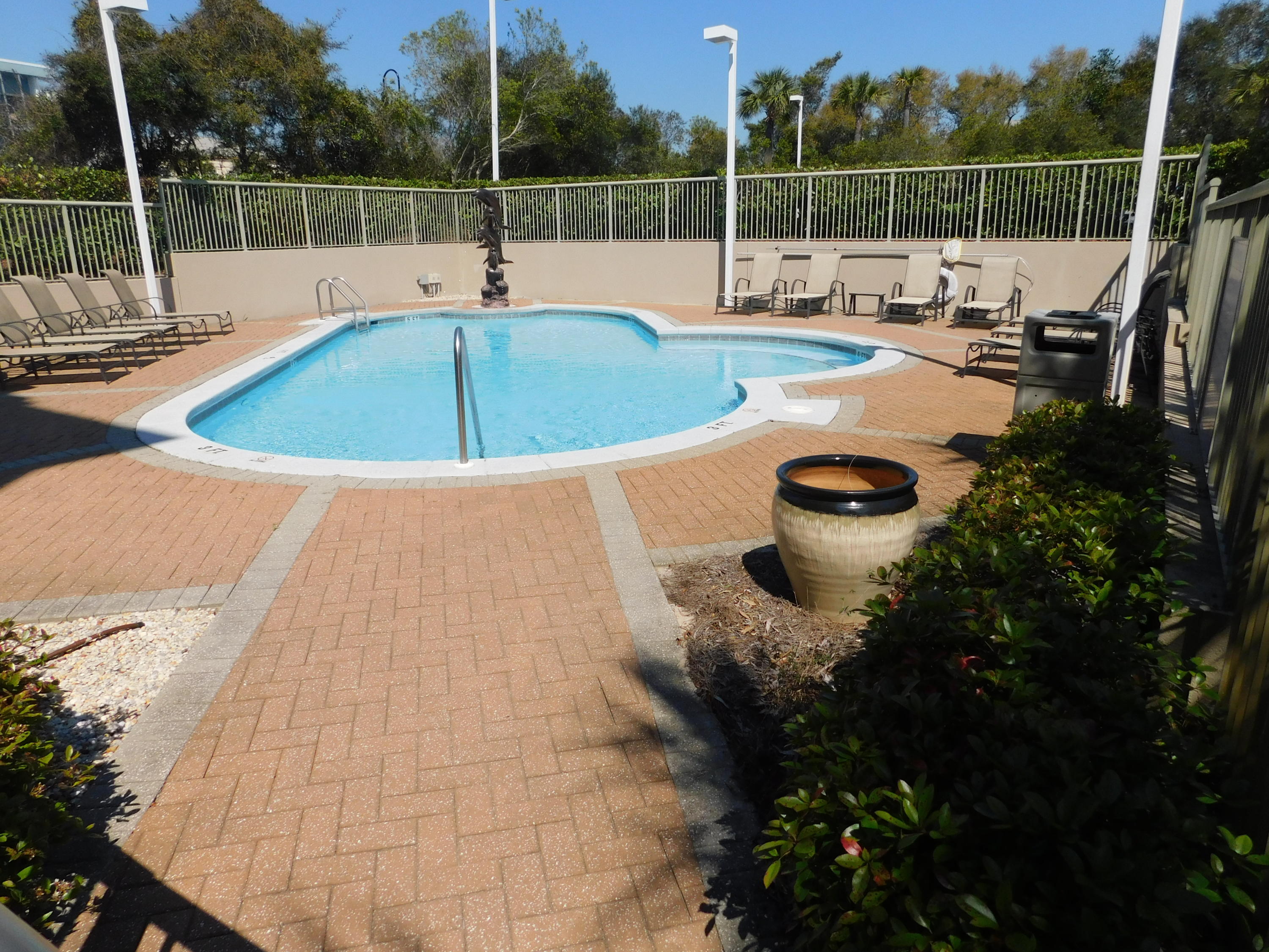 4368 West County Highway 30A, Unit 401 Santa Rosa Beach, FL 32459 - Photo 18 of 22 a view of a swimming pool with a patio