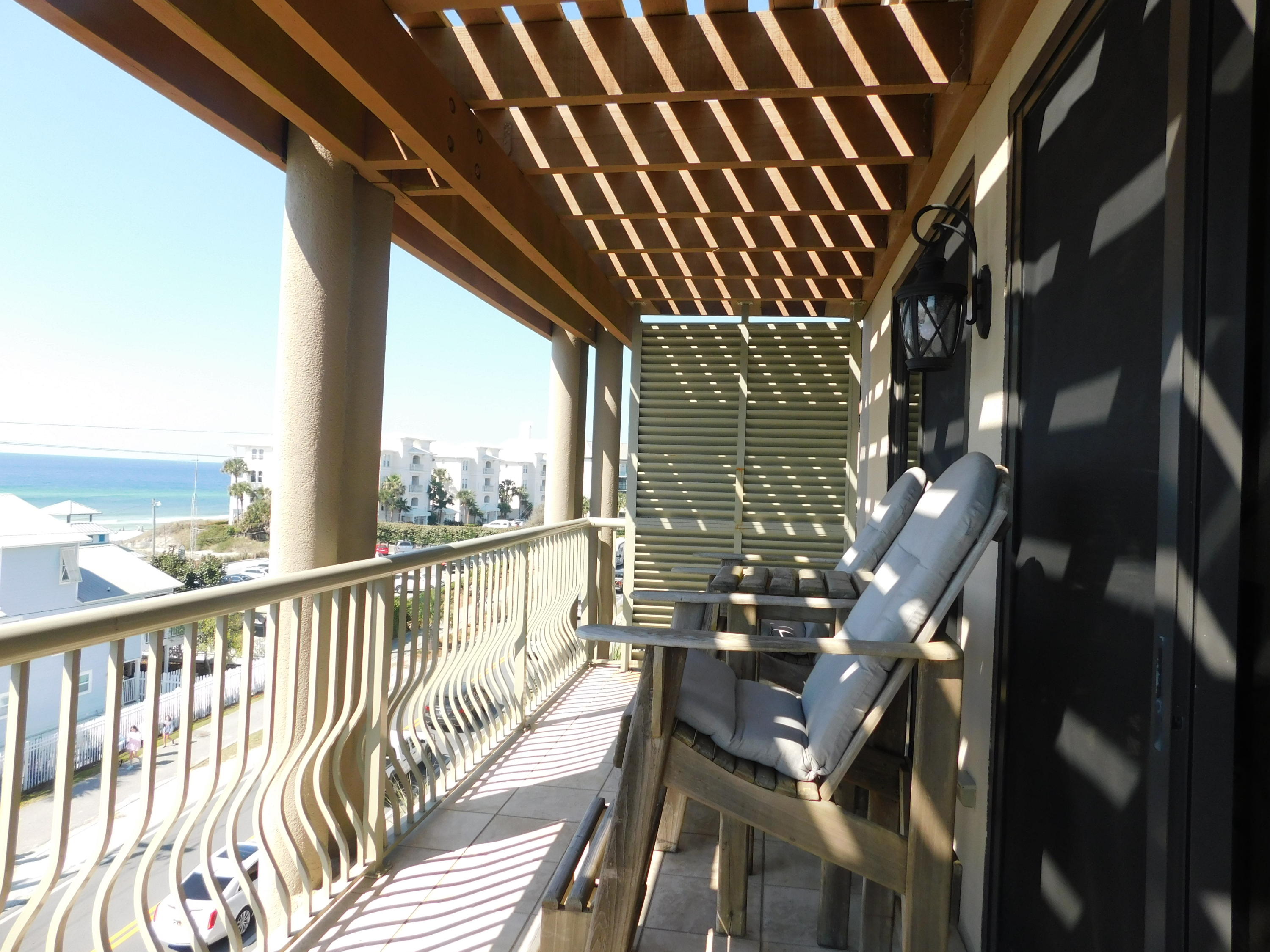 4368 West County Highway 30A, Unit 401 Santa Rosa Beach, FL 32459 - Photo 5 of 22 a view of balcony with wooden floor