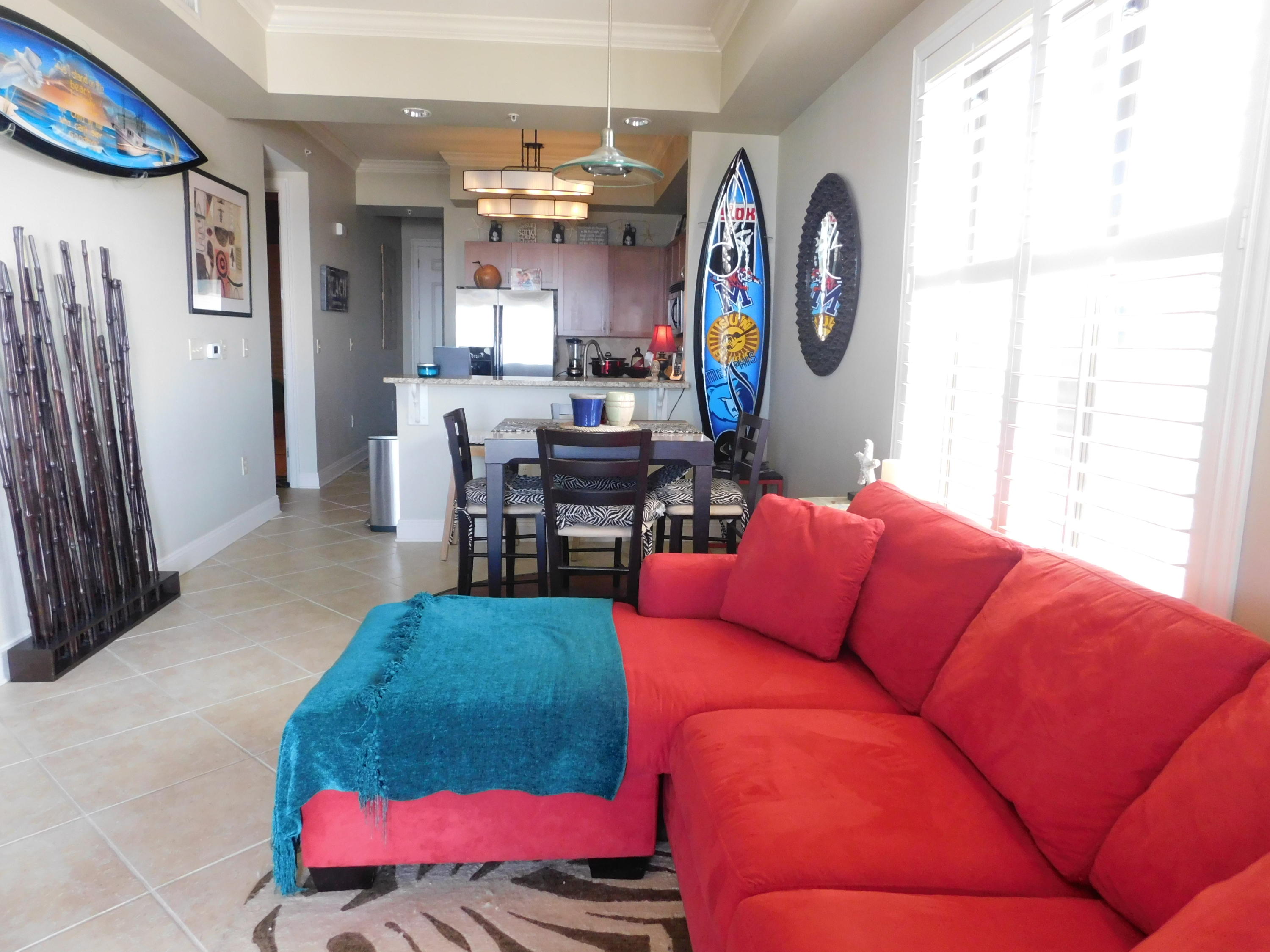 4368 West County Highway 30A, Unit 401 Santa Rosa Beach, FL 32459 - Photo 9 of 22 a living room with furniture a rug and a window