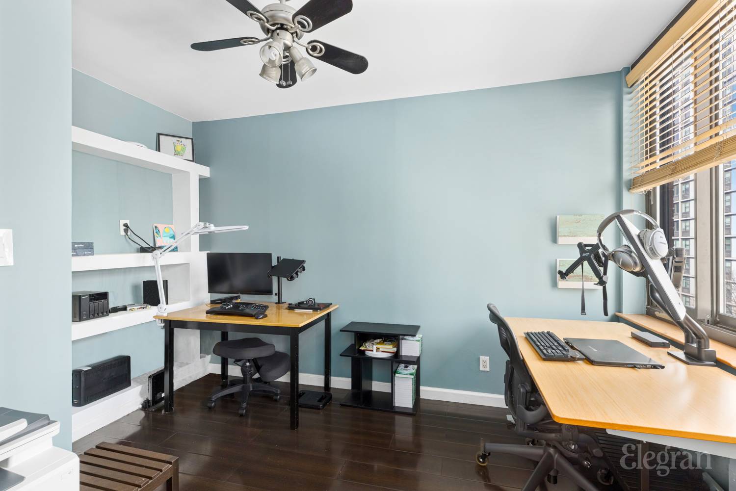 300 Albany Street, Unit 7I Manhattan, NY 10280 - Photo 3 of 9 a workspace with furniture and window