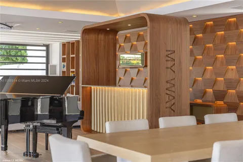 a view of a living room and wooden floor