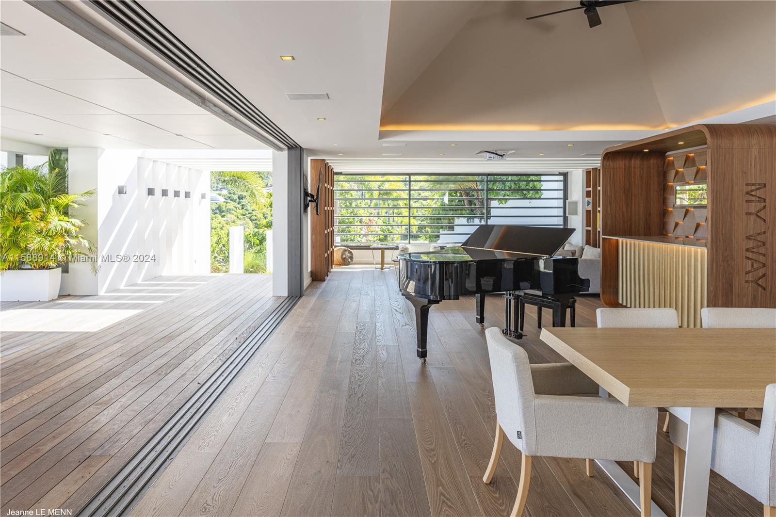 Source Colombier, SA 00000 - Photo 16 of 40 a view of a dining room with furniture window and outside view