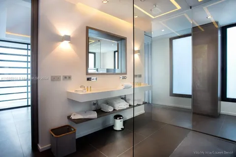 a kitchen with a stove and a refrigerator