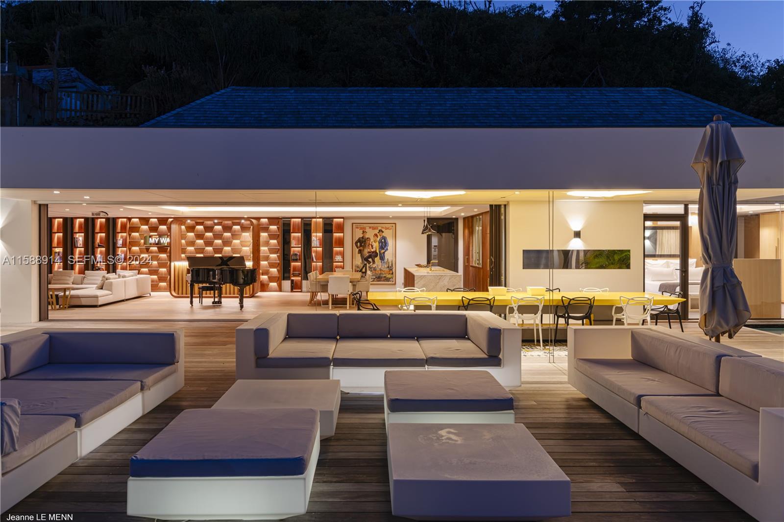 Source Colombier, SA 00000 - Photo 40 of 40 a living room with furniture and a large window