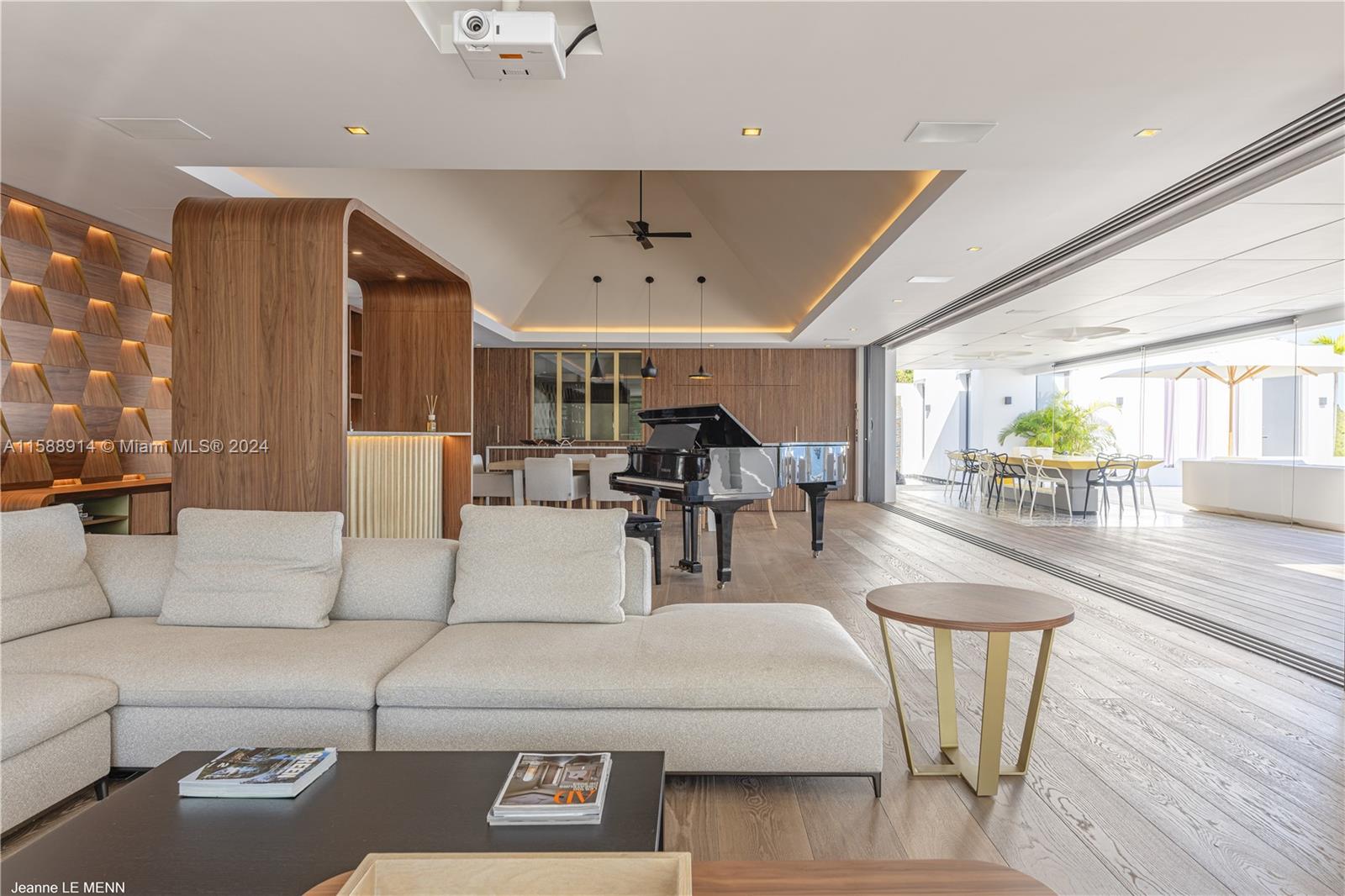 Source Colombier, SA 00000 - Photo 6 of 40 a living room with furniture and a large window