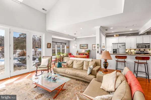 a white bath tub sitting next to a white toilet