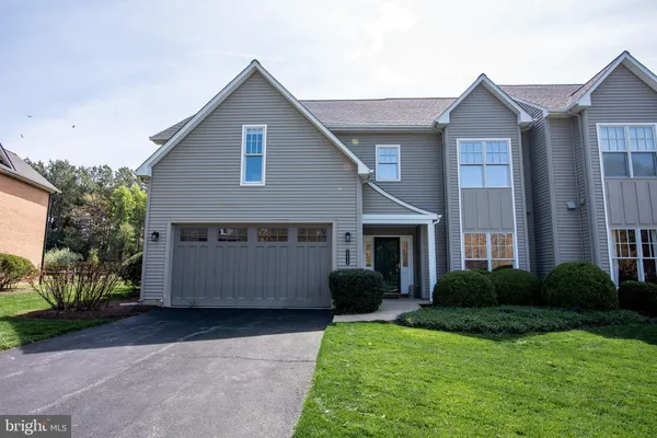 a view of outdoor space yard and front view of a house