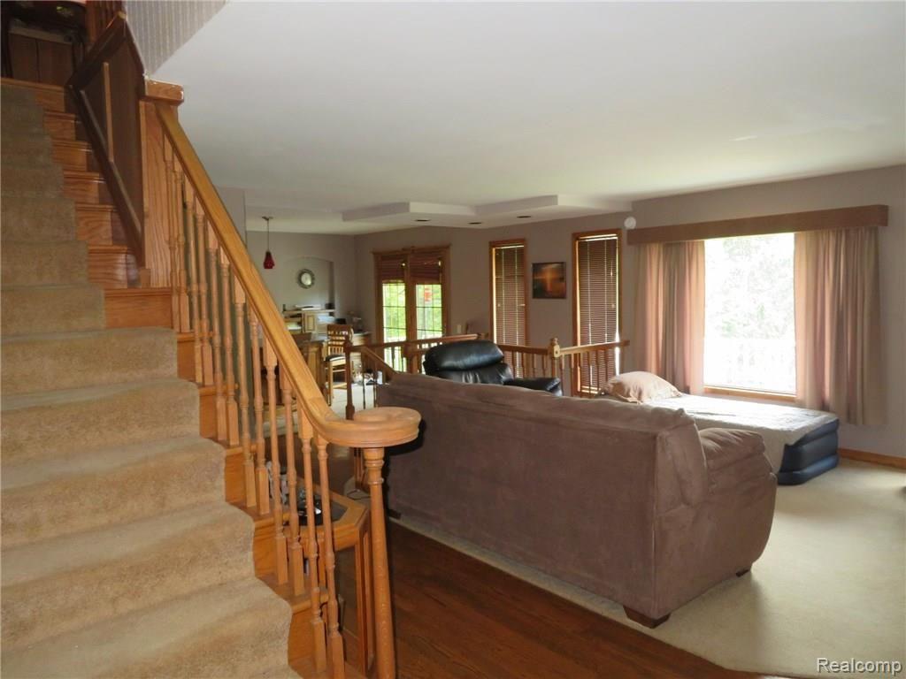 8705 Tindall Road Davisburg, MI 48350 - Photo 16 of 68 family room looks out to backyard scenery