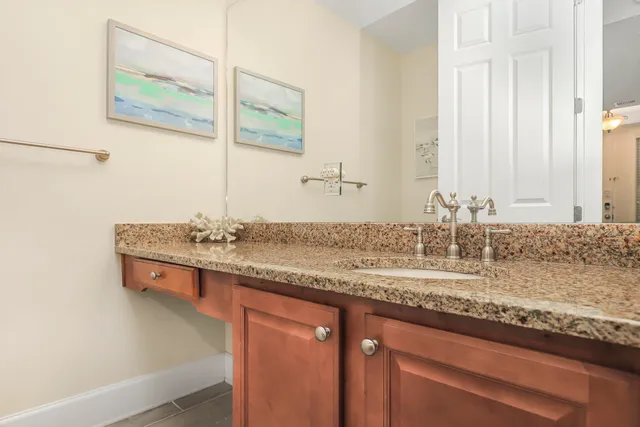 a bathroom with a toilet and shower