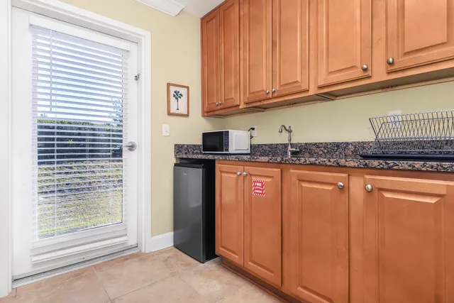 a bedroom with a bed and flat screen tv