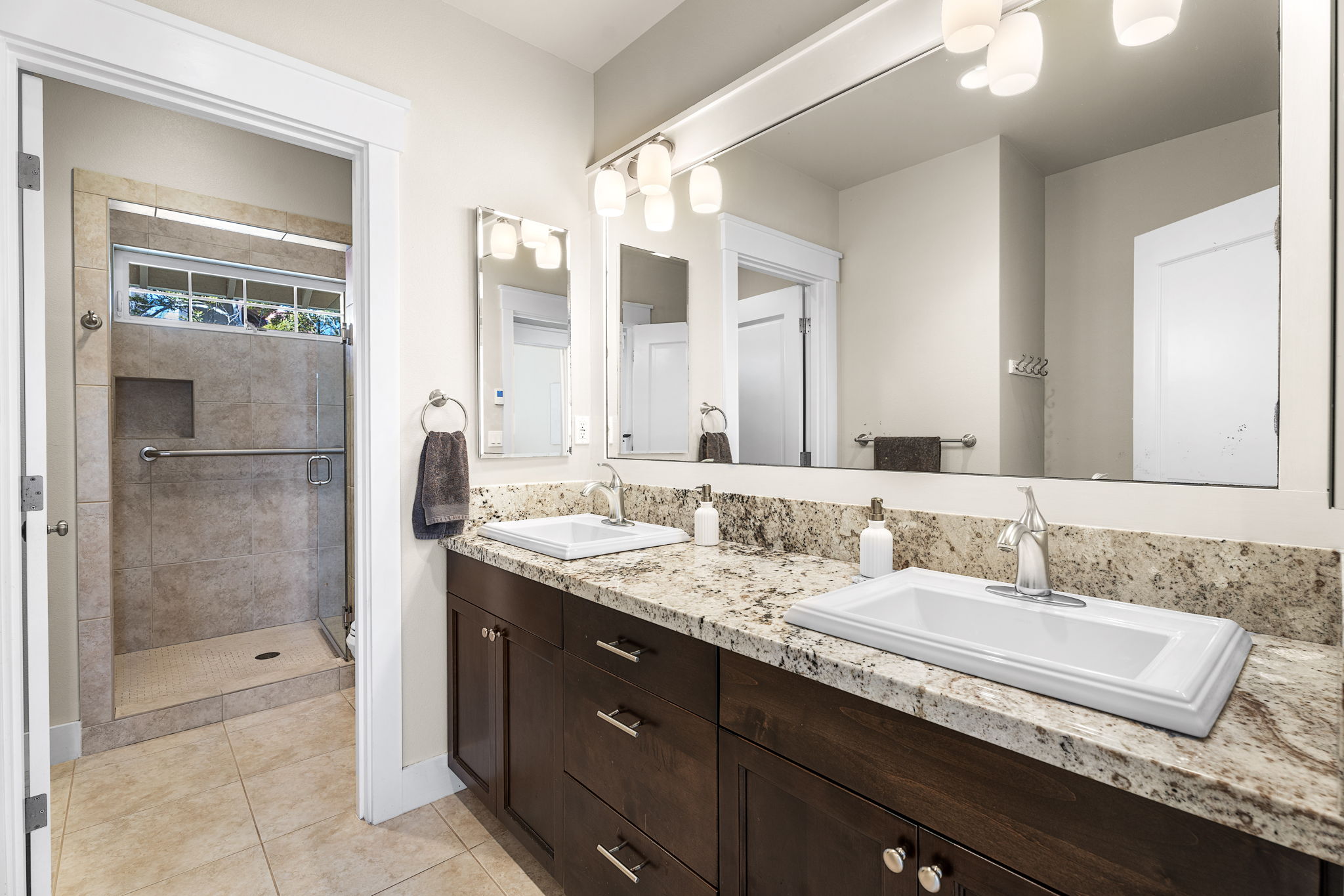 65-1294 Hoku Road Kamuela, HI 96743 - Photo 12 of 30 a bathroom with a granite countertop sink mirror and double