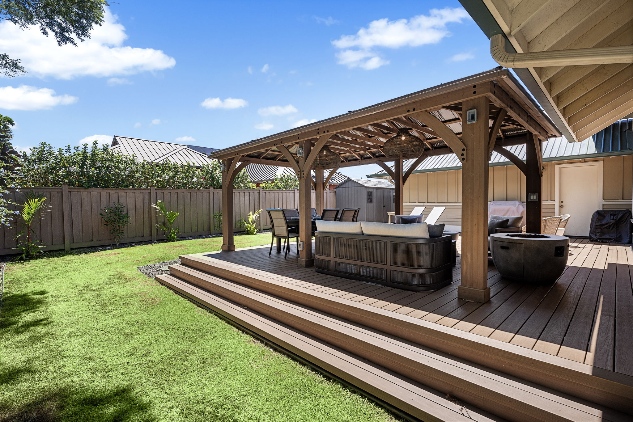 65-1294 Hoku Road Kamuela, HI 96743 - Photo 23 of 30 a view of a house with a yard patio and fire pit