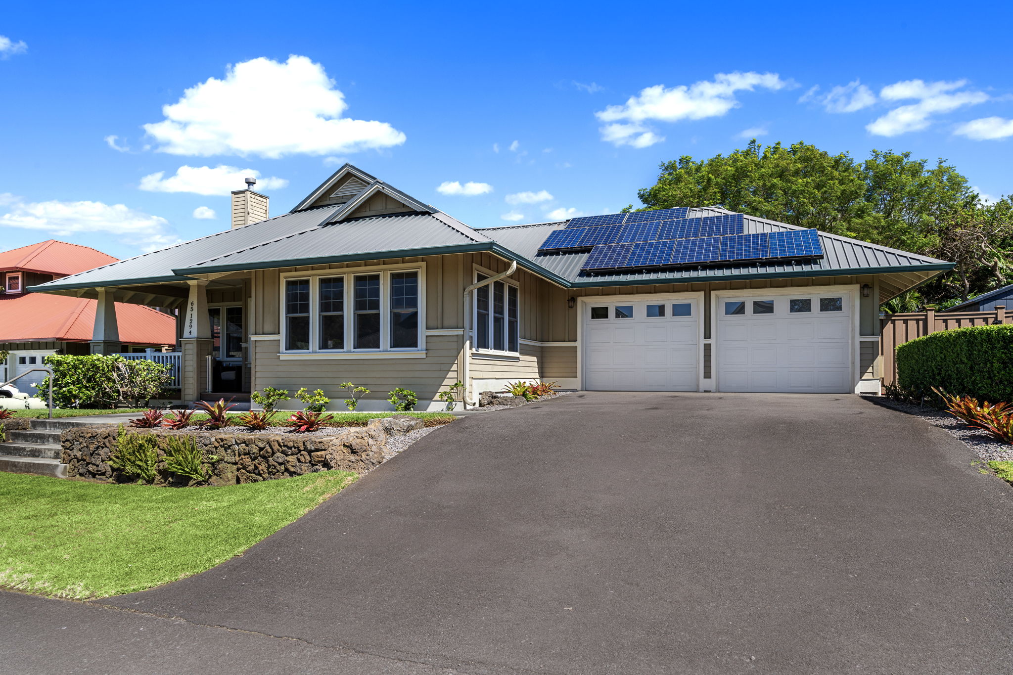 65-1294 Hoku Road Kamuela, HI 96743 - Photo 26 of 30 a front view of a house with a garden